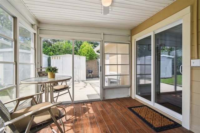 3628 Dellefield St, New Port Richey, FL 34655 - sunroom with a ceiling fan and outdoor dining space