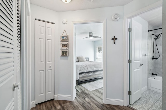 3628 Dellefield St, New Port Richey, FL 34655 - hallway with baseboards and dark wood-type flooring