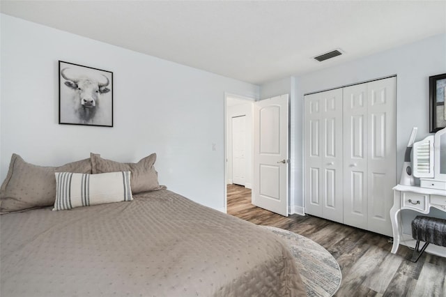 3628 Dellefield St, New Port Richey, FL 34655 - bedroom with wood finished floors, a closet, and baseboards