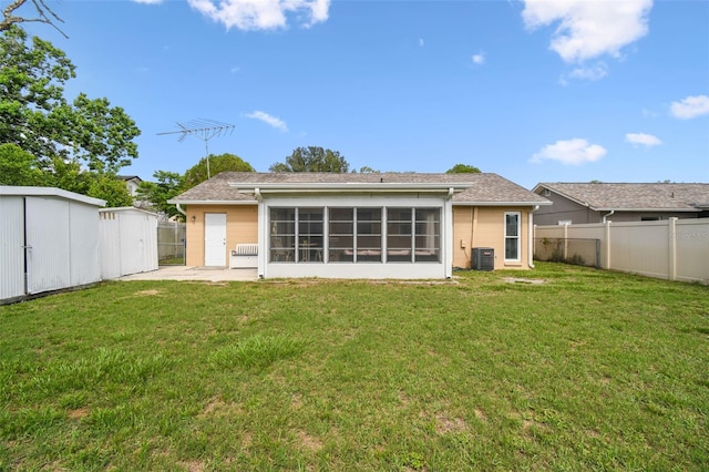 3628 Dellefield St, New Port Richey, FL 34655 - back of house with central AC and a patio area