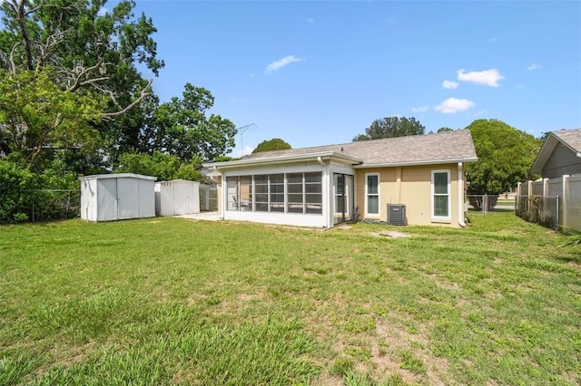 3628 Dellefield St, New Port Richey, FL 34655 - rear view of house featuring a sunroom
