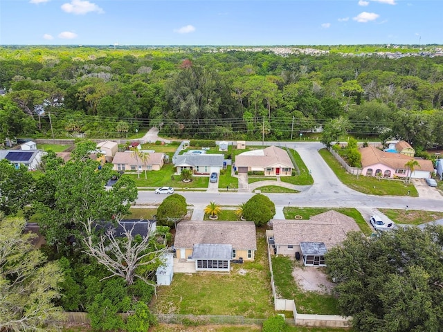 3628 Dellefield St, New Port Richey, FL 34655 - aerial perspective of suburban area featuring a forest
