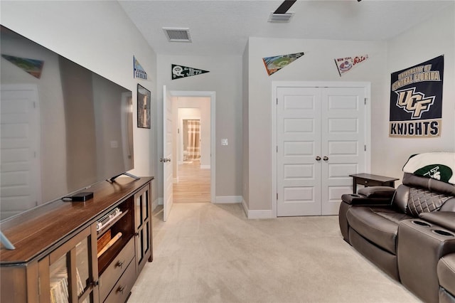 7116 Estero Ct, Apollo Beach, FL 33572 - living room featuring light carpet and baseboards