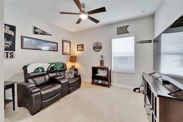 7116 Estero Ct, Apollo Beach, FL 33572 - living room with ceiling fan and light colored carpet
