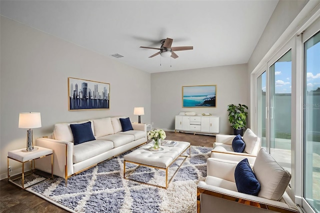 6841 Mitchell Cir, Tampa, FL 33634 - living room featuring a ceiling fan and baseboards