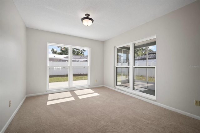6841 Mitchell Cir, Tampa, FL 33634 - carpeted spare room with baseboards