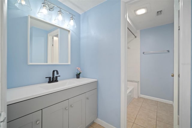 6841 Mitchell Cir, Tampa, FL 33634 - bathroom with vanity, washtub / shower combination, and tile patterned floors