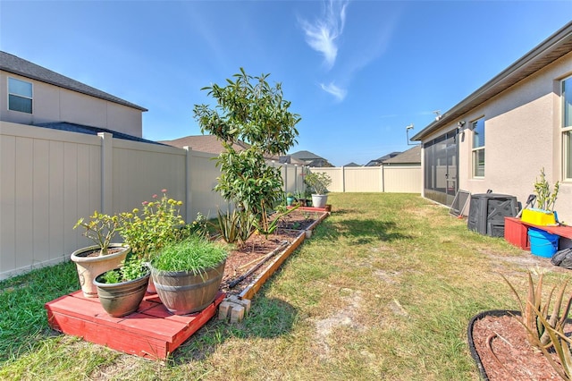 25200 Lambrusco Loop, Lutz, FL 33559 - fenced backyard featuring a garden and a sunroom