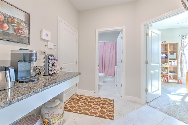 25200 Lambrusco Loop, Lutz, FL 33559 - full bathroom with tile patterned floors and shower / bath combo with shower curtain