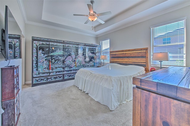 25200 Lambrusco Loop, Lutz, FL 33559 - bedroom featuring multiple windows, carpet floors, a tray ceiling, crown molding, and ceiling fan