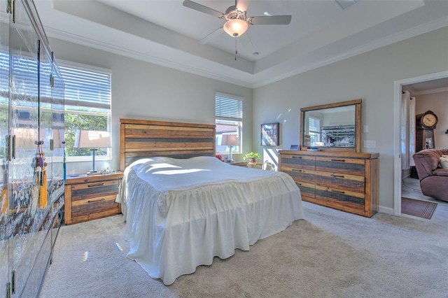 25200 Lambrusco Loop, Lutz, FL 33559 - carpeted bedroom with crown molding, a raised ceiling, and ceiling fan