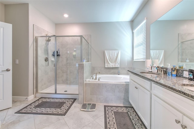 25200 Lambrusco Loop, Lutz, FL 33559 - bathroom featuring a garden tub, a stall shower, double vanity, and tile patterned floors
