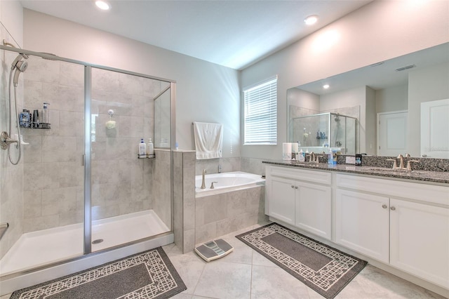 25200 Lambrusco Loop, Lutz, FL 33559 - bathroom with a stall shower, a garden tub, double vanity, tile patterned flooring, and recessed lighting