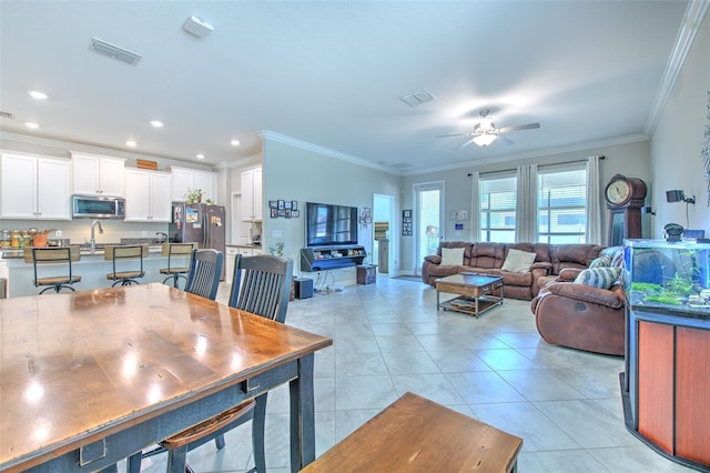 25200 Lambrusco Loop, Lutz, FL 33559 - dining area with ornamental molding, a ceiling fan, light tile patterned floors, and recessed lighting
