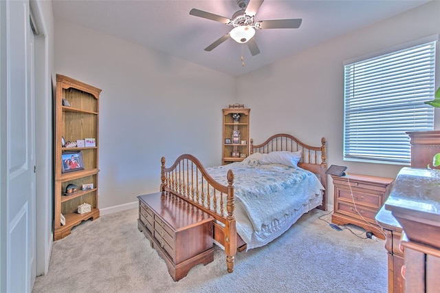 25200 Lambrusco Loop, Lutz, FL 33559 - carpeted bedroom with multiple windows and a ceiling fan