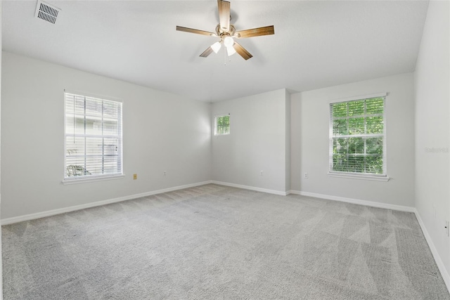 27563 Pleasure Ride Loop, Wesley Chapel, FL 33544 - carpeted spare room with plenty of natural light and ceiling fan