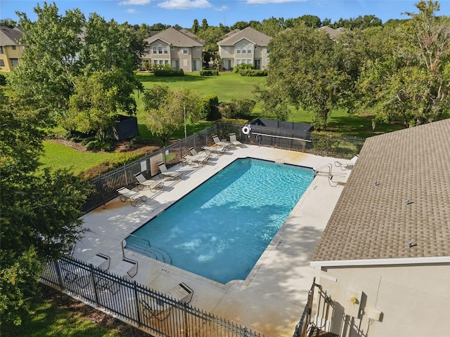 27563 Pleasure Ride Loop, Wesley Chapel, FL 33544 - community pool with a patio and a residential view