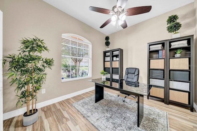 32624 Summerglade Dr, Wesley Chapel, FL 33545 - office space with vaulted ceiling, a ceiling fan, and light wood-style flooring