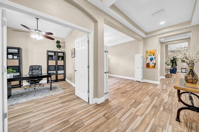 32624 Summerglade Dr, Wesley Chapel, FL 33545 - office area with light wood-style flooring, a ceiling fan, and vaulted ceiling