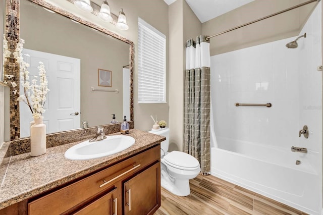 32624 Summerglade Dr, Wesley Chapel, FL 33545 - bathroom with vanity, shower / bath combo with shower curtain, and wood finished floors
