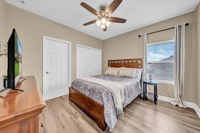32624 Summerglade Dr, Wesley Chapel, FL 33545 - bedroom with light wood-style flooring, a closet, and a ceiling fan