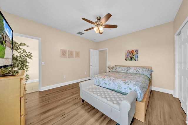 32624 Summerglade Dr, Wesley Chapel, FL 33545 - bedroom featuring wood finished floors, a closet, and ceiling fan