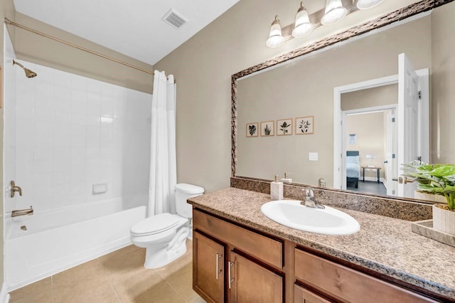 32624 Summerglade Dr, Wesley Chapel, FL 33545 - bathroom with shower / bath combination with curtain, vanity, tile patterned flooring, and ensuite bath