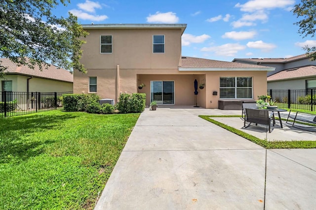 32624 Summerglade Dr, Wesley Chapel, FL 33545 - rear view of property featuring stucco siding and a patio