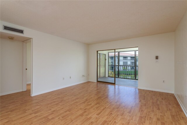 2650 Countryside Blvd Unit C204, Clearwater, FL 33761 - empty room featuring light wood-style flooring and baseboards