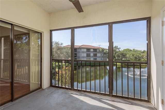 2650 Countryside Blvd Unit C204, Clearwater, FL 33761 - unfurnished sunroom with a water view and healthy amount of natural light