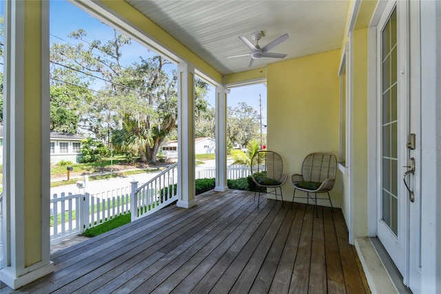 238 7th Ave S, Safety Harbor, FL 34695 - unfurnished sunroom featuring a ceiling fan