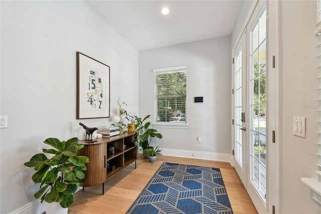238 7th Ave S, Safety Harbor, FL 34695 - foyer with baseboards and wood finished floors