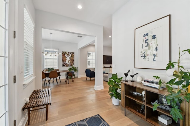 238 7th Ave S, Safety Harbor, FL 34695 - entrance foyer featuring light wood-style floors, a chandelier, and recessed lighting