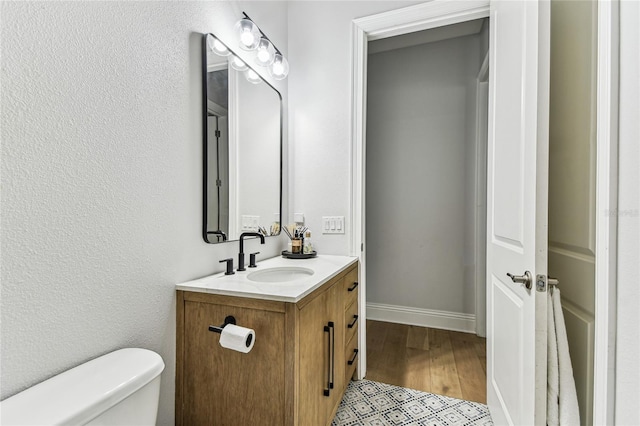 238 7th Ave S, Safety Harbor, FL 34695 - bathroom with vanity and wood finished floors