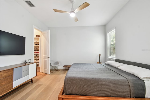 238 7th Ave S, Safety Harbor, FL 34695 - bedroom featuring light wood-style flooring and ceiling fan