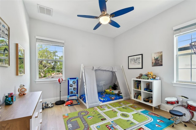 238 7th Ave S, Safety Harbor, FL 34695 - rec room featuring healthy amount of natural light, wood finished floors, and a ceiling fan