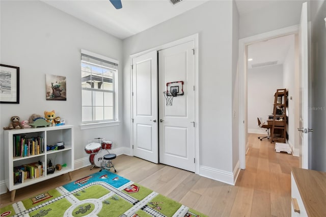 238 7th Ave S, Safety Harbor, FL 34695 - recreation room with light wood-style floors and baseboards