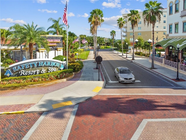 238 7th Ave S, Safety Harbor, FL 34695 - view of asphalt street with curbs, sidewalks, and street lights