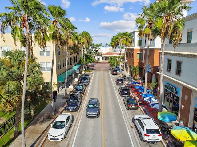 238 7th Ave S, Safety Harbor, FL 34695 - view of asphalt street featuring sidewalks, street lights, and curbs