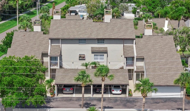 4777 Duhme Rd Unit 1D, Saint Petersburg, FL 33708 - view of building exterior featuring covered parking