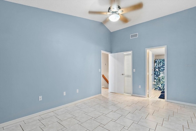 4777 Duhme Rd Unit 1D, Saint Petersburg, FL 33708 - tiled spare room with ceiling fan and high vaulted ceiling