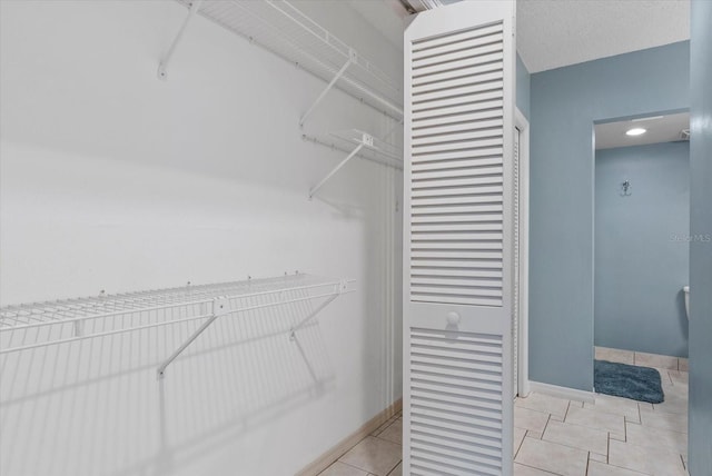 4777 Duhme Rd Unit 1D, Saint Petersburg, FL 33708 - spacious closet featuring light tile patterned floors