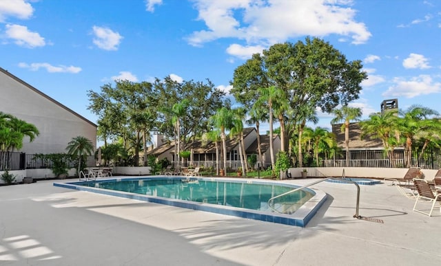 4777 Duhme Rd Unit 1D, Saint Petersburg, FL 33708 - community pool featuring a patio