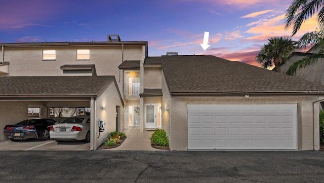 4777 Duhme Rd Unit 1D, Saint Petersburg, FL 33708 - traditional home featuring stucco siding and a shingled roof