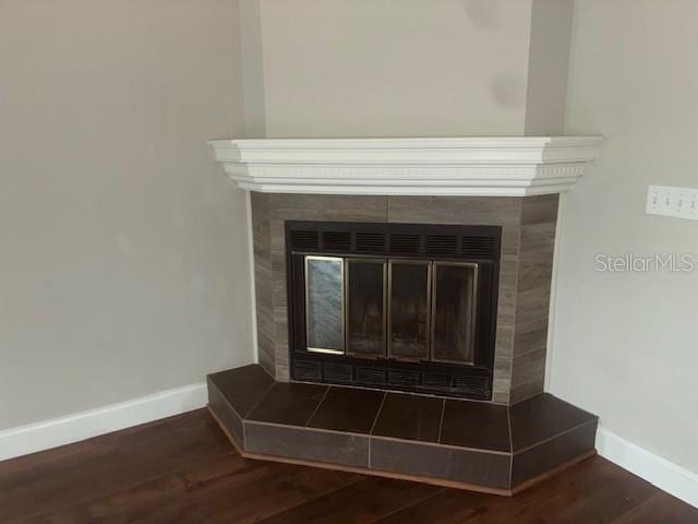 8033 55th St E, Palmetto, FL 34221 - detailed view of wood finished floors and a fireplace