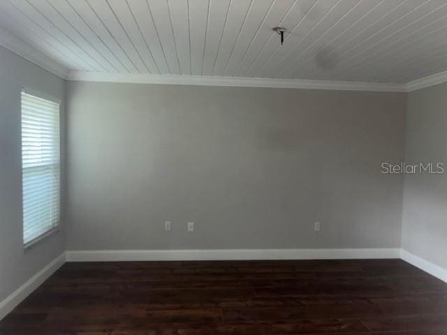 8033 55th St E, Palmetto, FL 34221 - unfurnished room featuring crown molding, healthy amount of natural light, and dark wood-style floors