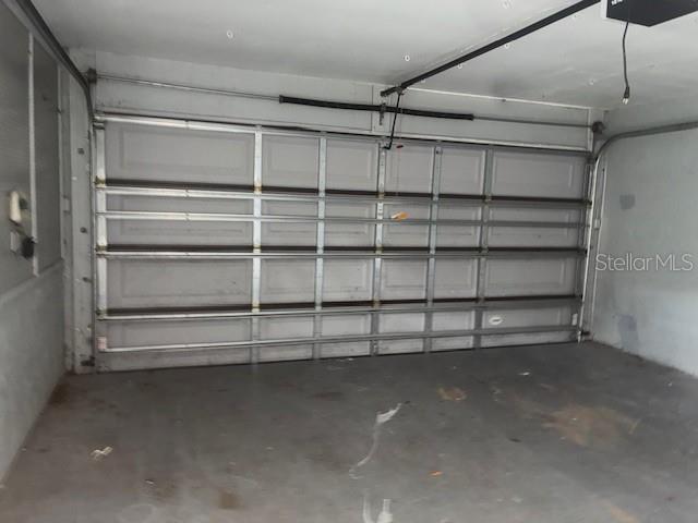 8033 55th St E, Palmetto, FL 34221 - garage with a garage door opener
