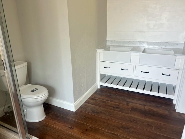 8033 55th St E, Palmetto, FL 34221 - bathroom featuring hardwood / wood-style floors and vanity