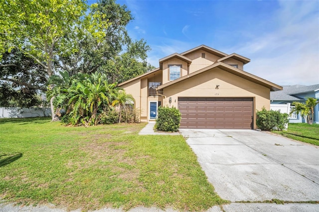 1715 Larabie Ct, Brandon, FL 33511 - view of front of property with stucco siding, a garage, and driveway