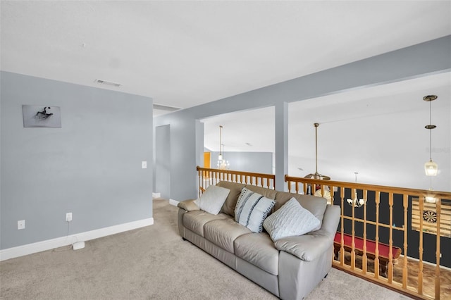 1715 Larabie Ct, Brandon, FL 33511 - carpeted living room featuring baseboards and a chandelier